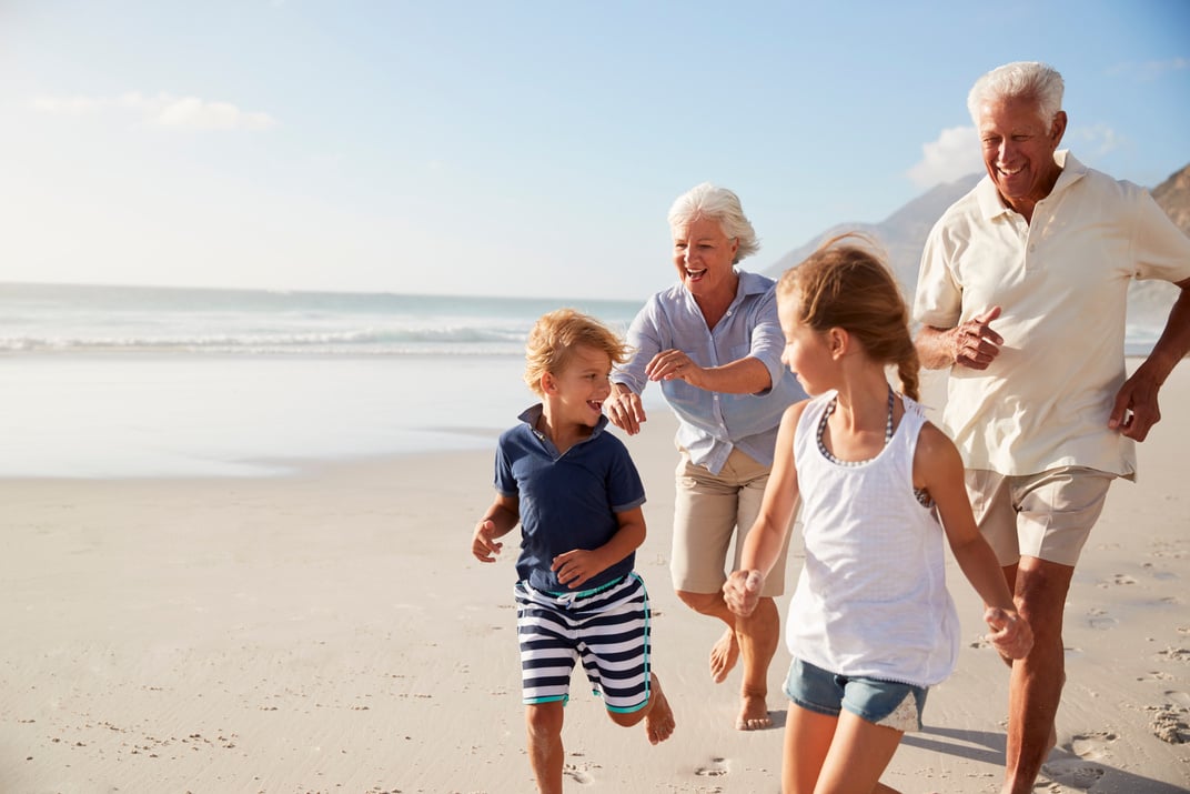 Grandparents and Children on Summer Beach